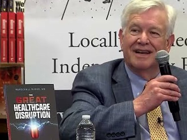Dr. Marschall Runge speaking at Harvard Bookstore